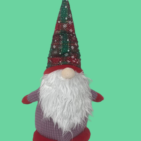 Decorative gnome with a colorful hat on a white background