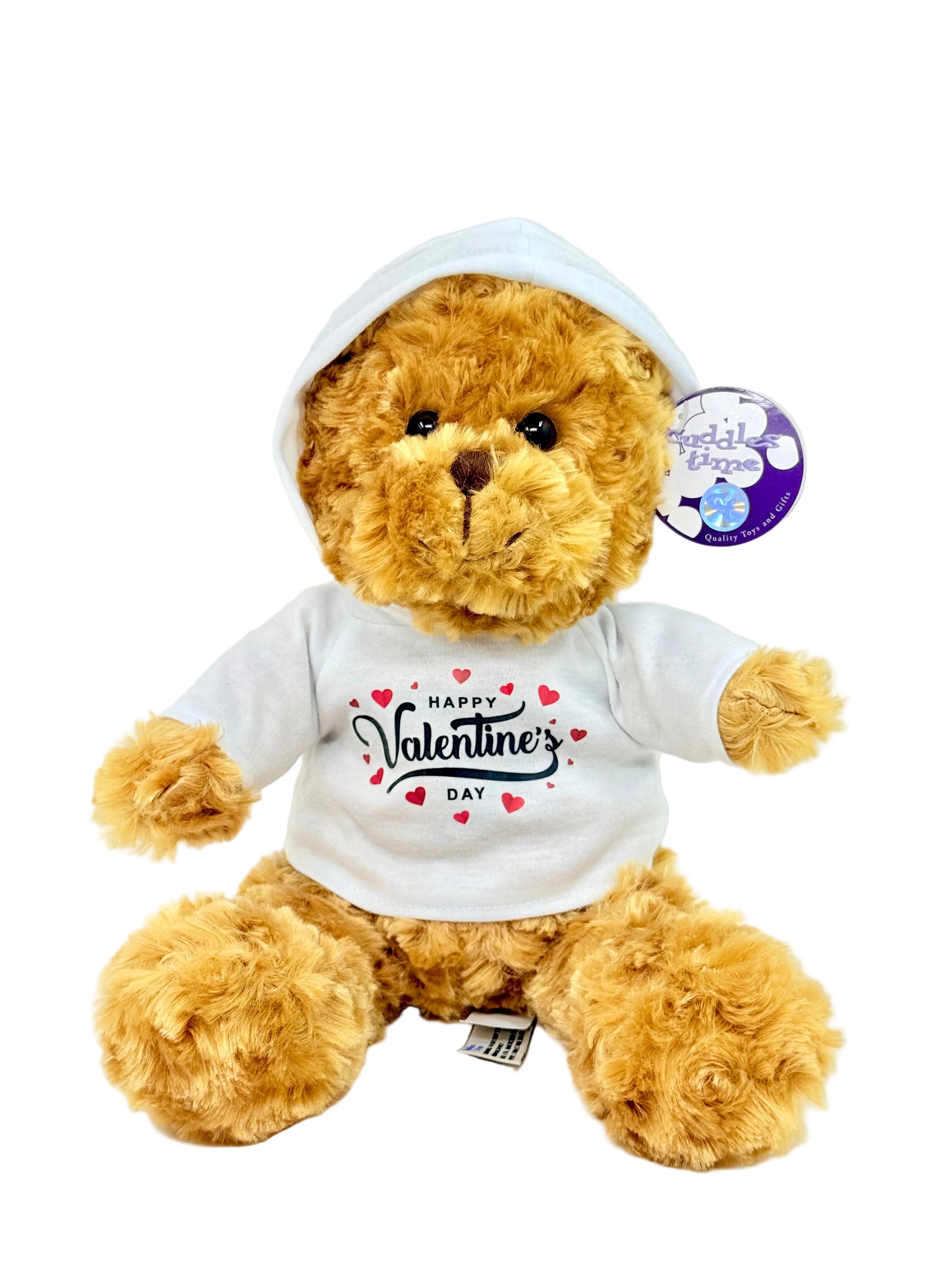 Teddy bear wearing a 'Happy Valentine's Day' shirt on a white background