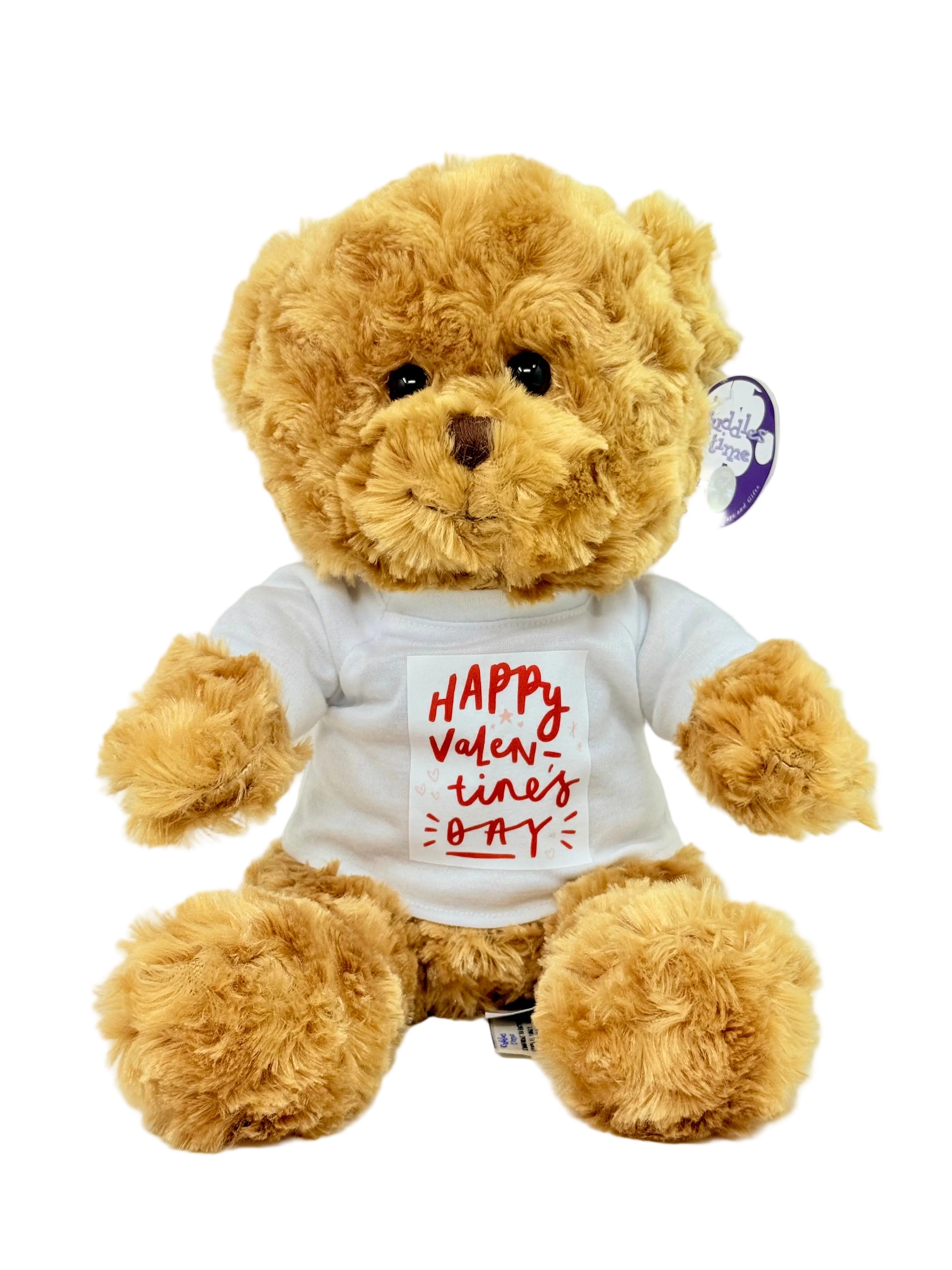 Plush teddy bear wearing a 'Happy Valentine's Day' shirt on a white background