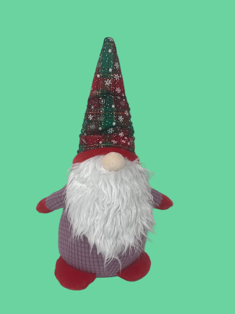 Decorative gnome with a colorful hat on a white background